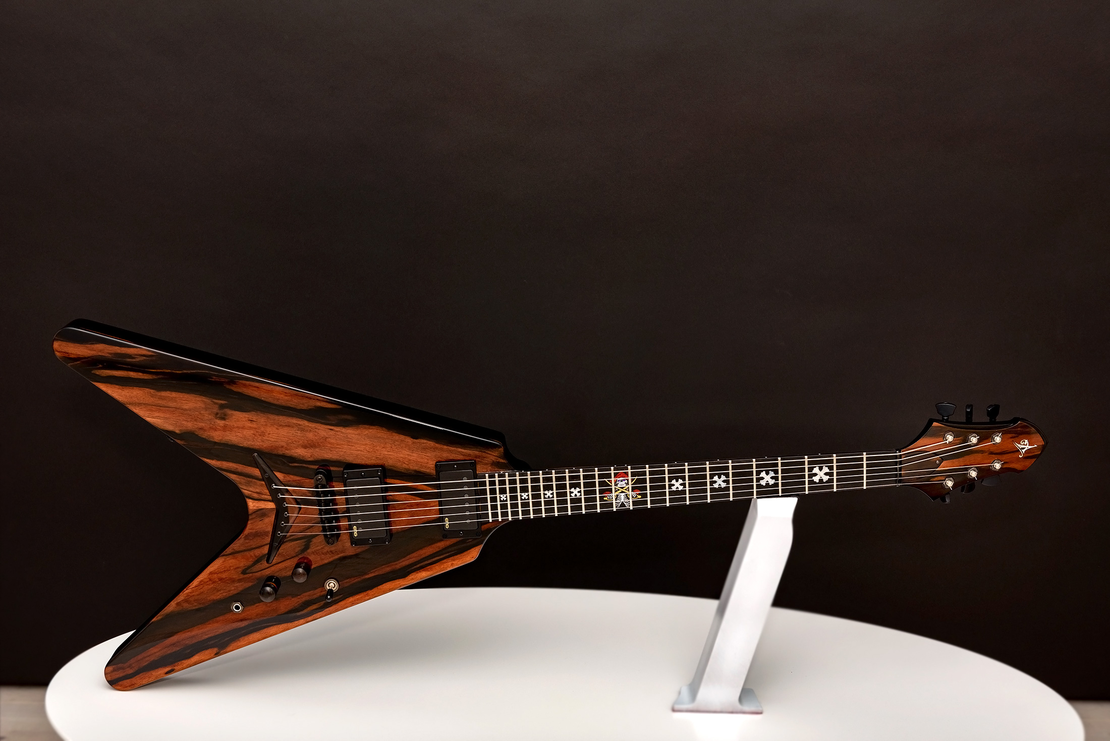 This is a custom guitar, built by a well-known luthier, Augustin Cristian Apostol (@ Avatar2100). Her name is The Pirate.