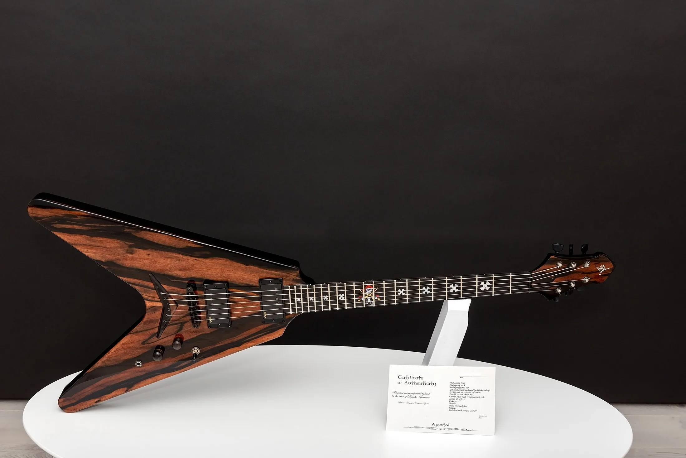 This is a custom guitar, built by a well-known luthier, Augustin Cristian Apostol (@ Avatar2100). Her name is The Serpent.