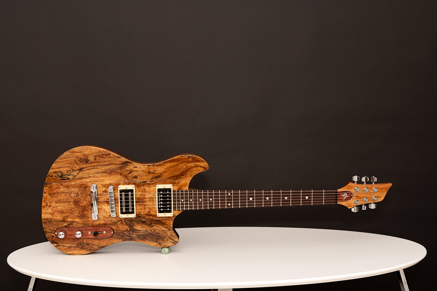 This guitar is called The Alchemist - Augustin is a luthier with over 15 years of experience, specializing in custom guitars