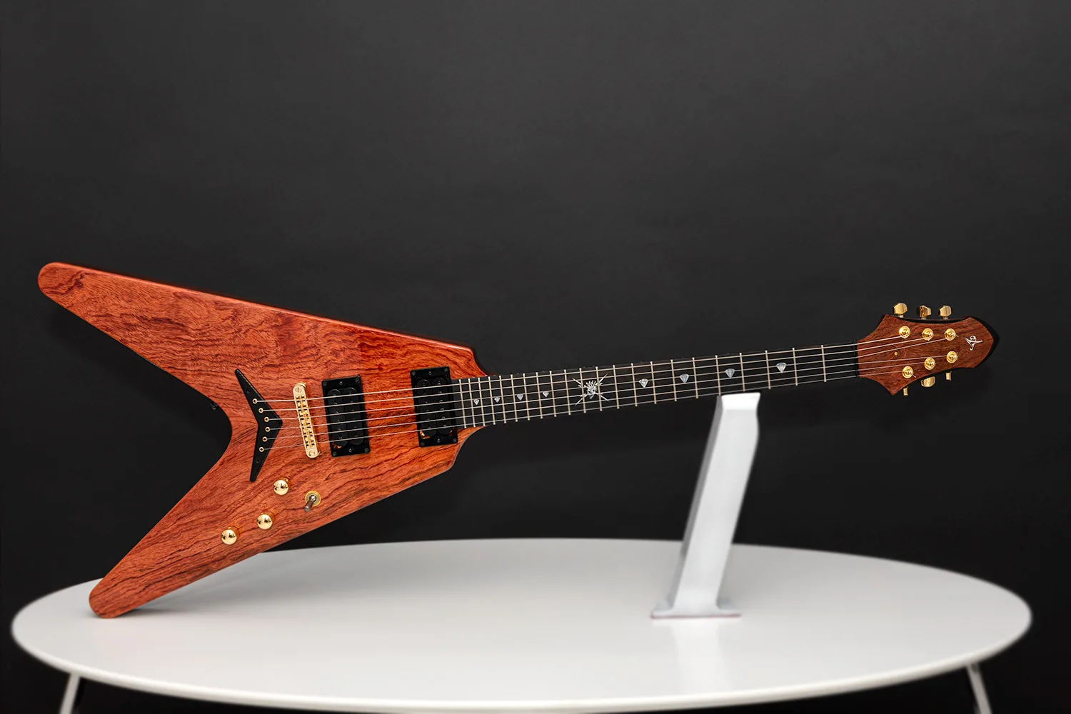 This is a custom guitar, built by a well-known luthier, Augustin Cristian Apostol (@ Avatar2100) for Kai Hansen.  Her name is Yggdrasil