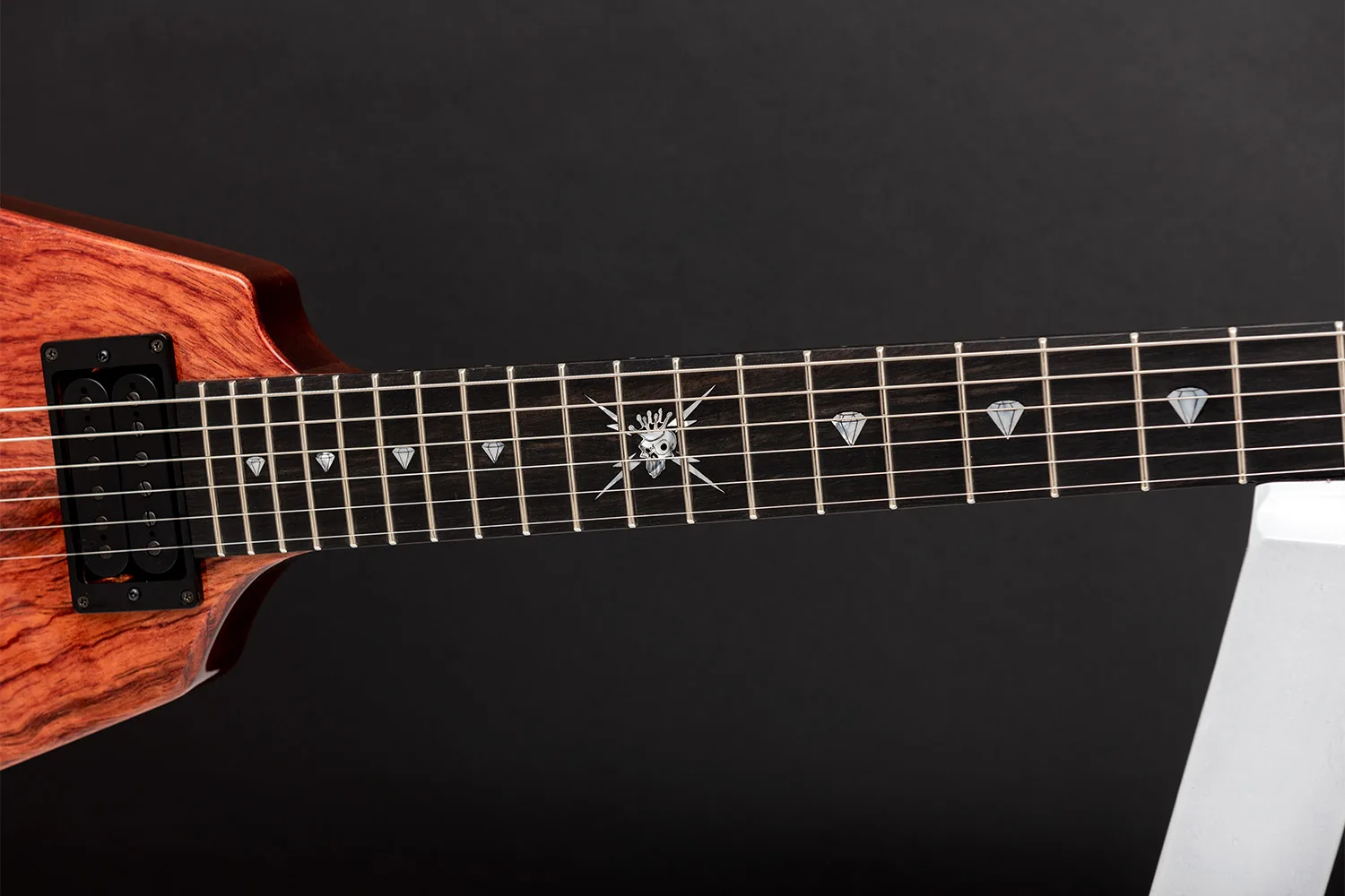 This is a custom guitar, built by a well-known luthier, Augustin Cristian Apostol (@ Avatar2100) for Kai Hansen.  Her name is Yggdrasil