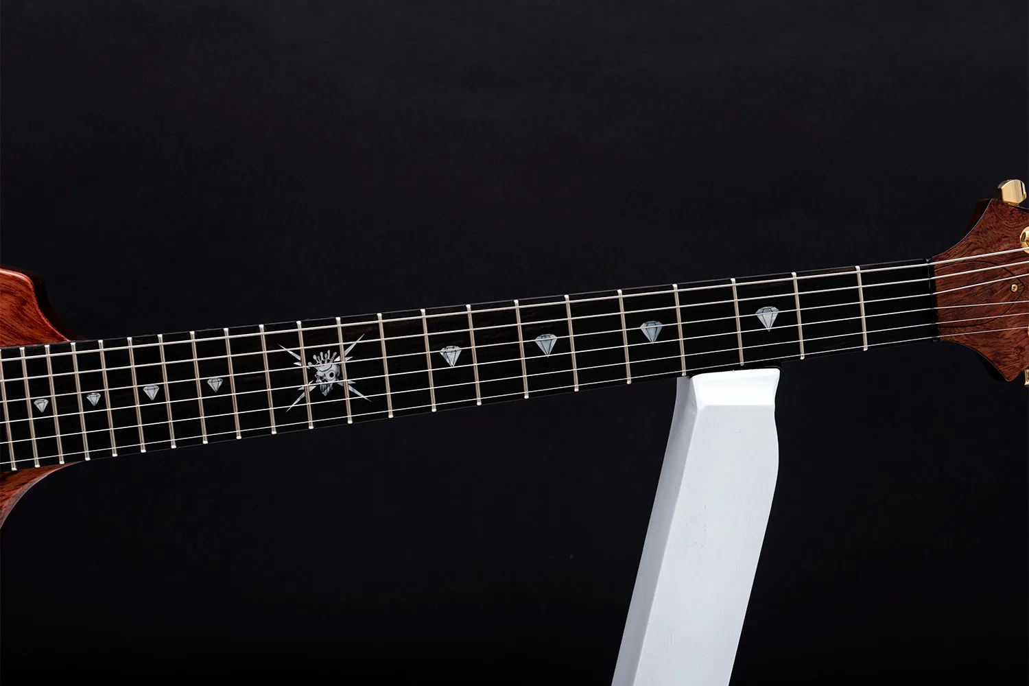 This is a custom guitar, built by a well-known luthier, Augustin Cristian Apostol (@ Avatar2100) for Kai Hansen.  Her name is Yggdrasil