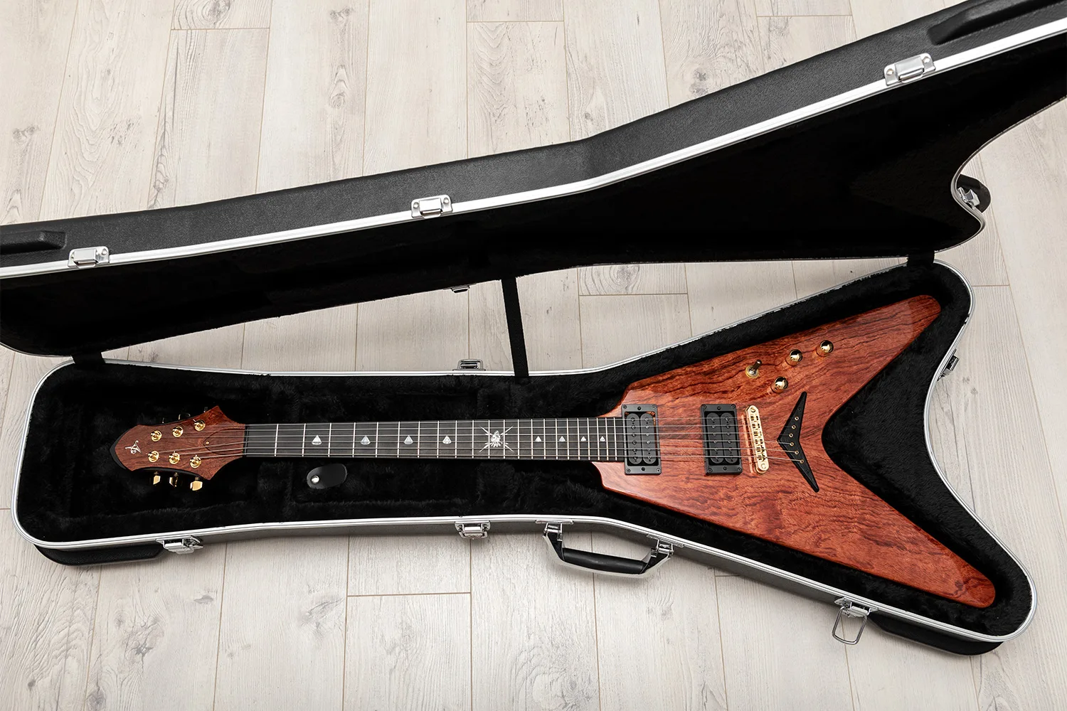 This is a custom guitar, built by a well-known luthier, Augustin Cristian Apostol (@ Avatar2100) for Kai Hansen.  Her name is Yggdrasil